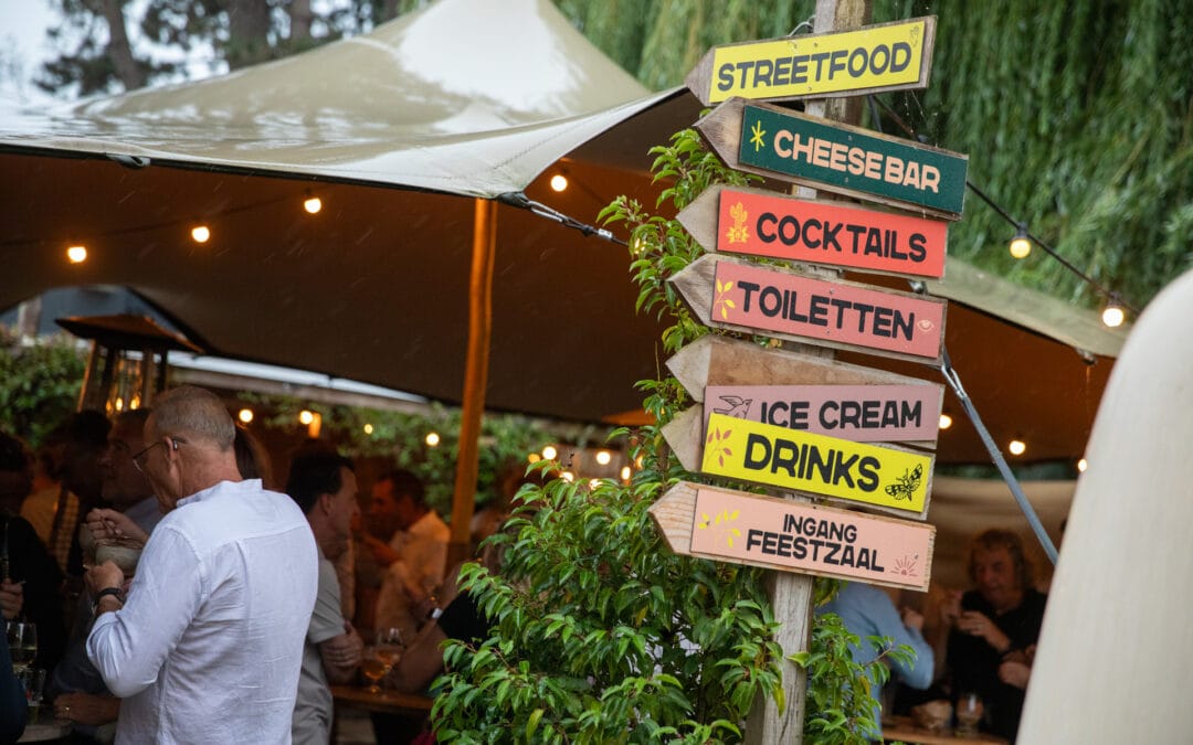 Zomerse BBQ viel bijna letterlijk in het water, maar werd een groot succes!